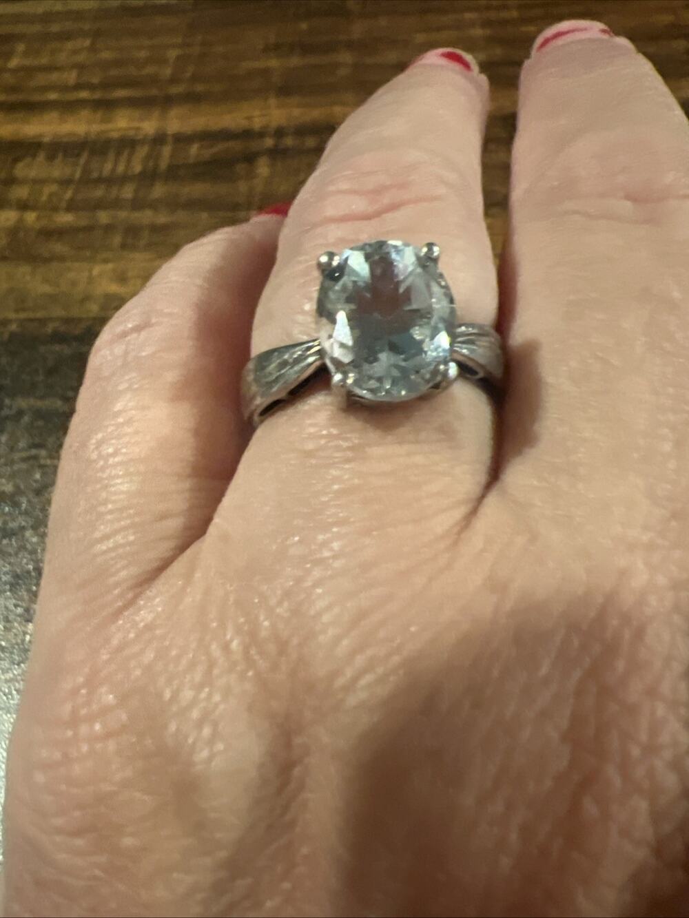 925 sterling silver oval-cut, pale blue stone ?aquamarine? Size 8